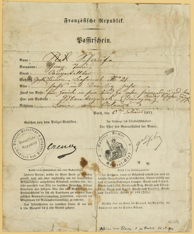 Gelblicher deutscher Regierungsbrief mit rundem schwarzem Stempel und schwarzer Tinte.