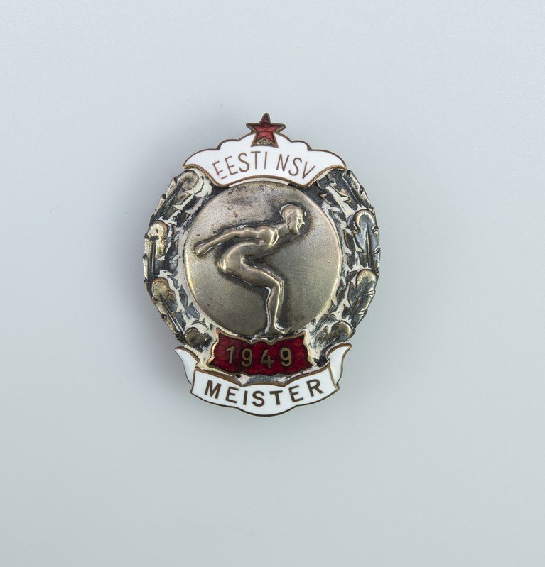 Silberner Anstecker mit rotem Stern und Text, Emblem der deutschen Olympischen Spiele 1949.